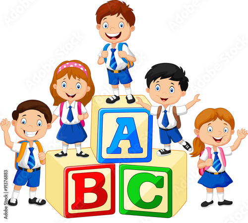 Happy school kids with alphabet blocks