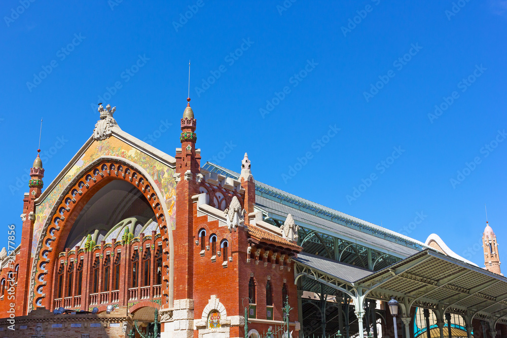 Fototapeta premium Columbus Market (Mercado de Colon), Valencia, Spain. Modernist architecture of the market building with colorful facade in summer.