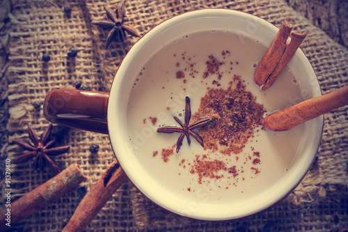 masala chai tea with spices and star Anise, cinnamon stick photo