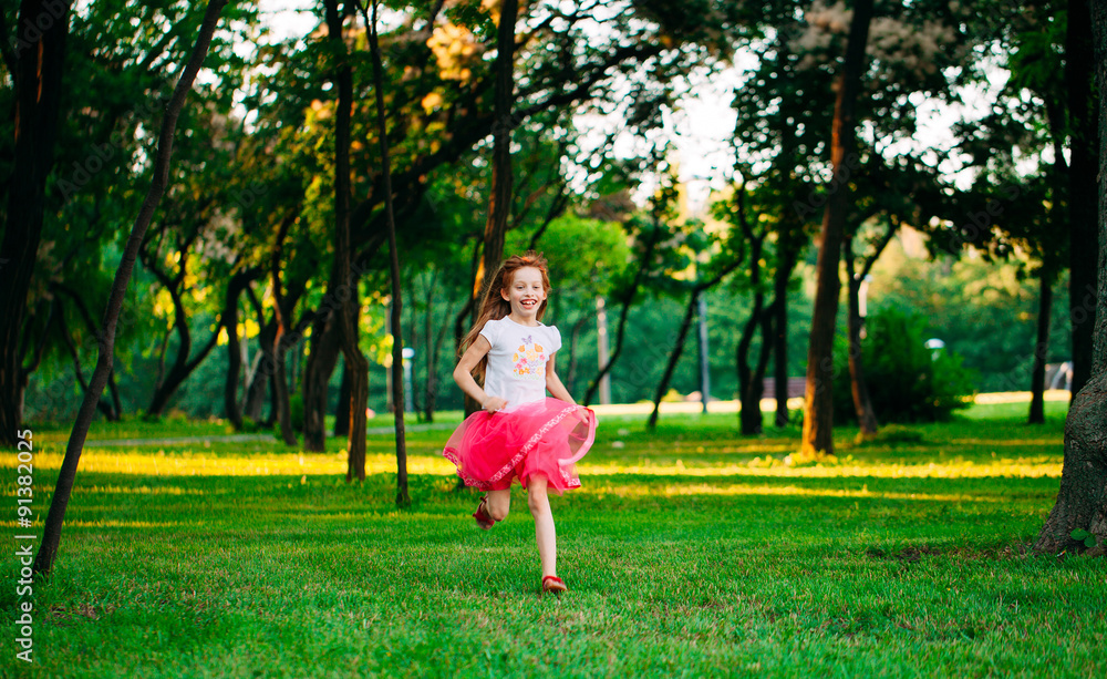  little girl running in the park