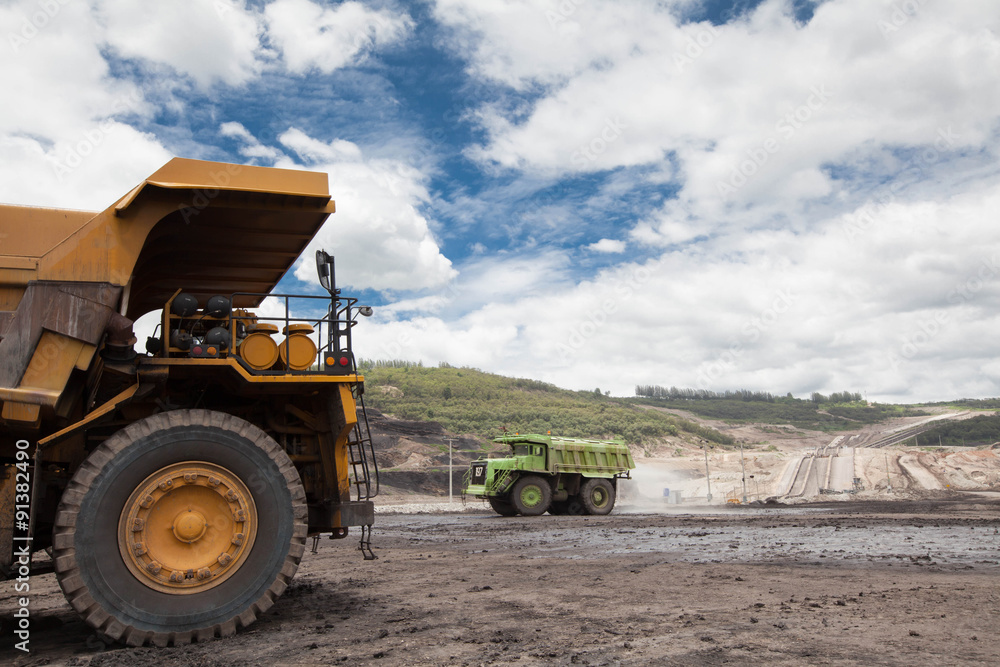 Fototapeta premium Haul Trucks being loaded with ore.