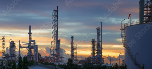 Silhouette of petrochemical plant or Oil and gas refinery in sunrise