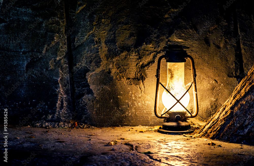 Old lamp in a mine Stock Photo | Adobe Stock