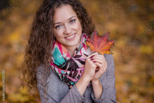 woman in the autumn park photo