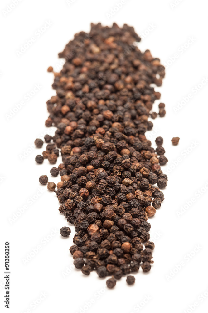Row of Organic Black pepper (Piper nigrum) isolated on white background. Row of Organic Black pepper (Piper nigrum) isolated on white background.