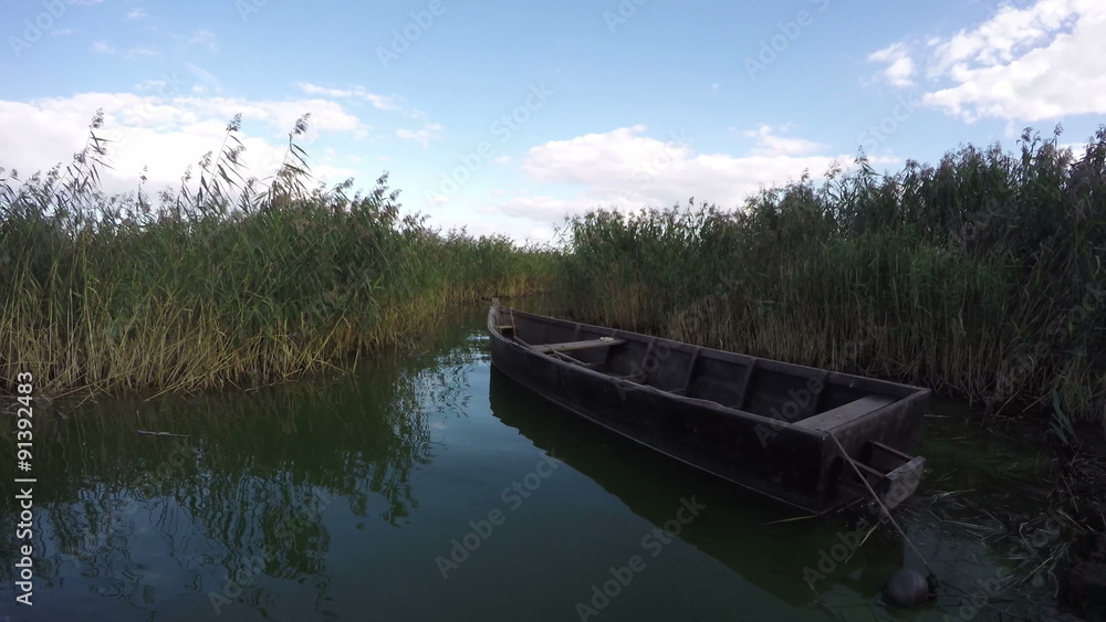 old wooden fishing boat near sea lake bay coast and wind in reeds. Timelapse 4K
old wooden fishing boat near sea lake bay coast and wind in reeds. Timelapse 4K