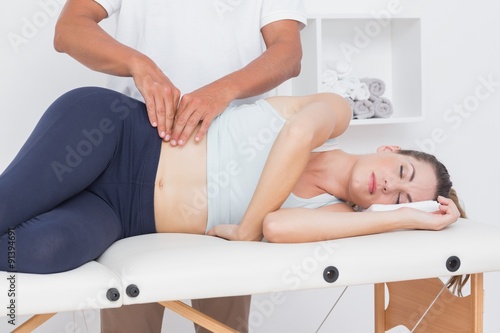 Bild auf Leinwand Doctor examining his patient pelvis