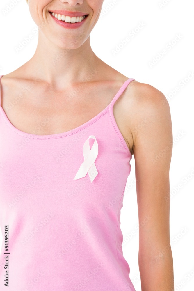 Woman wearing pink ribbon for breast cancer awareness Woman wearing pink ribbon for breast cancer awareness