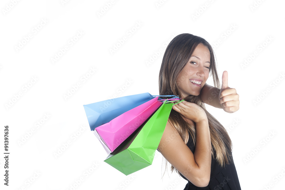 shopping woman showing thumb up gesture. Isolated on white background shopping woman showing thumb up gesture. Isolated on white background
