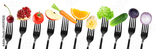 Color fruits and vegetables on fork