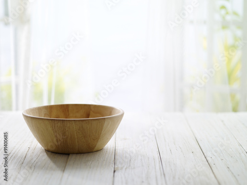 Fototapeta Naklejka Na Ścianę i Meble -  close-up look at wooden bowl with morning bright