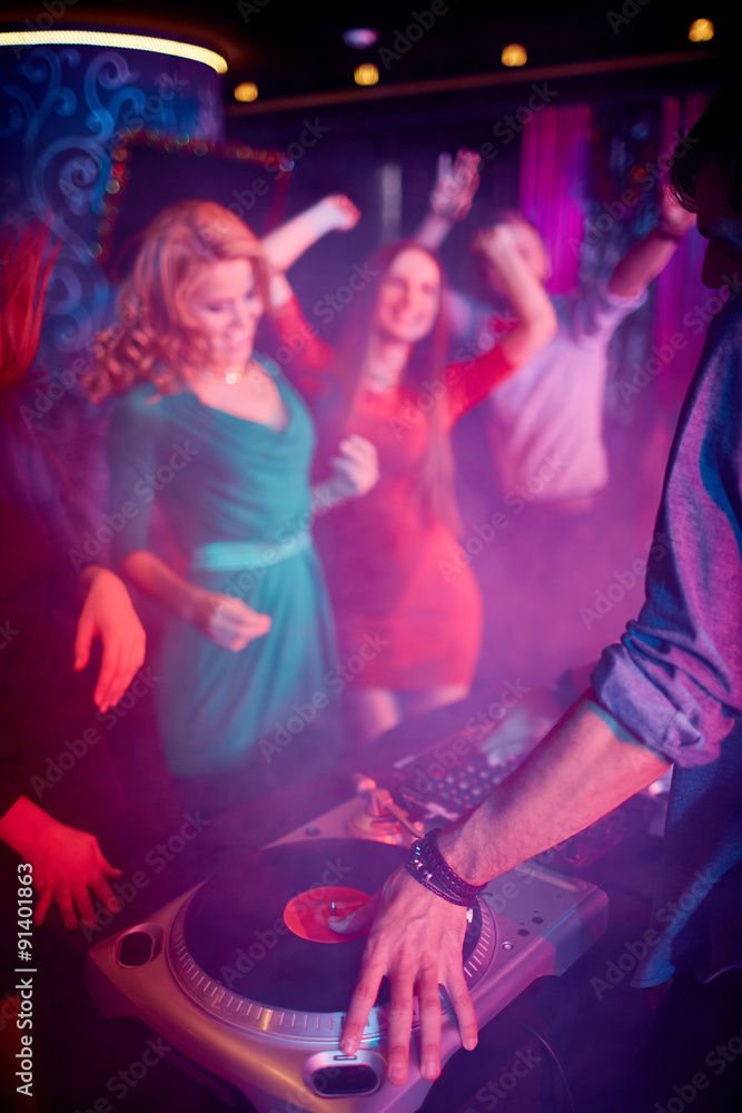 Hand of dj on vinyl disc Hand of dj on vinyl disc