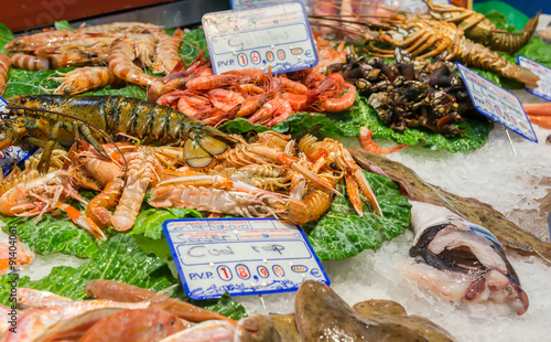 Fresh seafoods at the market La Boqueria in Barcelona. Spain