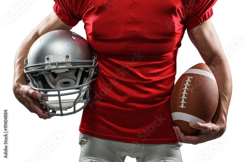 Midsection of American football player 