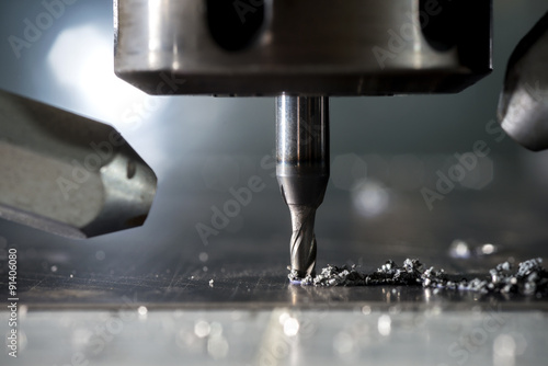 CNC metal machining by mill photo