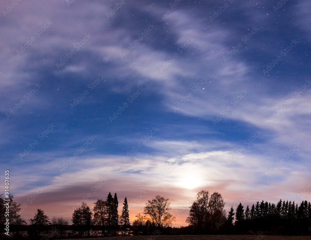 Night landscape and cloudy starry sky panorama