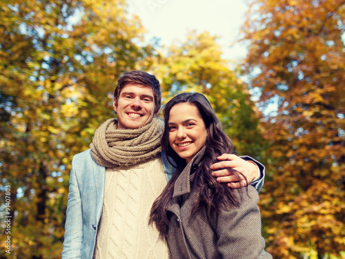 smiling couple hugging in autumn park © Syda Productions
