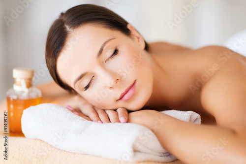 happy woman in spa salon