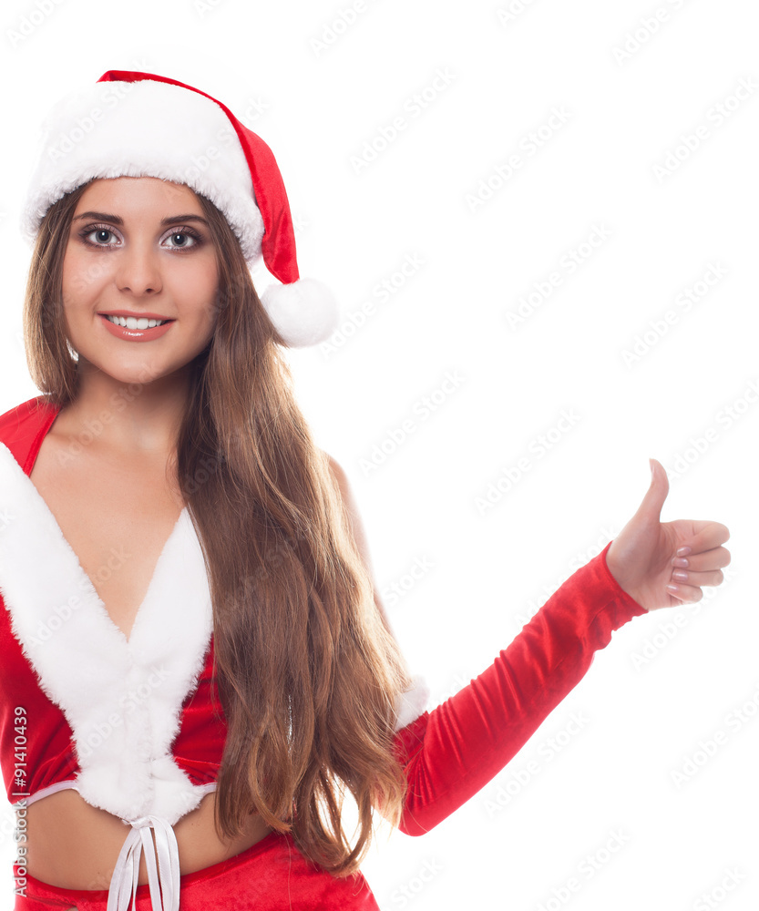 Happy woman dressed as Santa pointing at us, isolated against wh Happy woman dressed as Santa pointing at us, isolated against wh