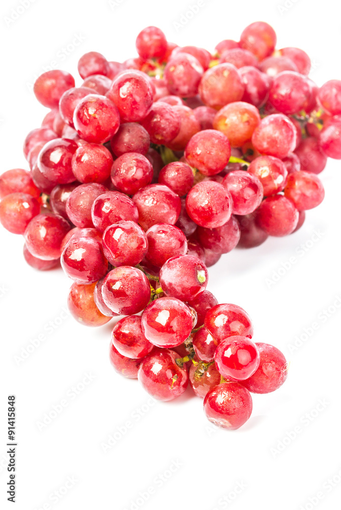 bunch of red soak grape on white background