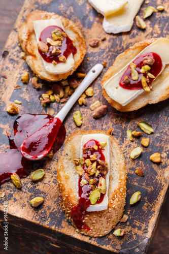 Bruschetta with brie cheese and raspberry jam.selective focus