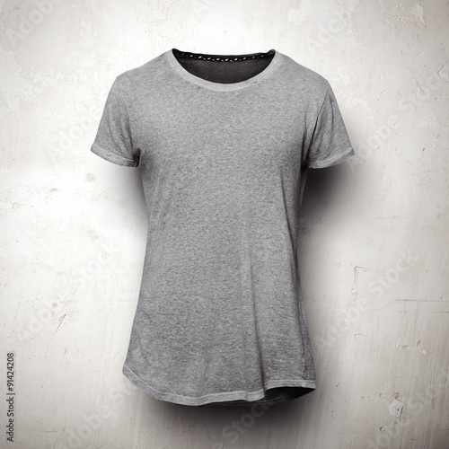 Grey t-shirt isolated on the grey background photo