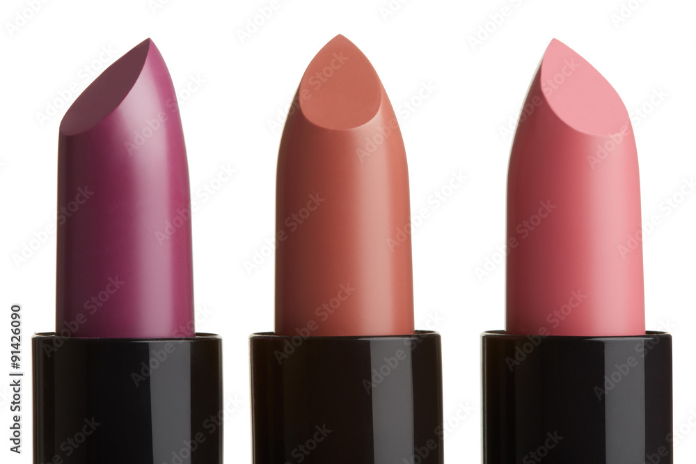 Obraz premium Lipstick group in purple, brown, pink colors on white, clipping path