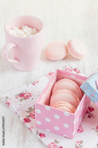 Pink macaroons in gift box. Pastel colored