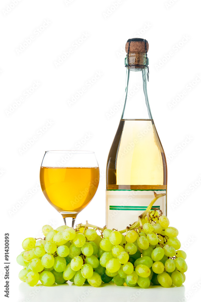 Ripe grapes, wine glass and bottle isolated on white background