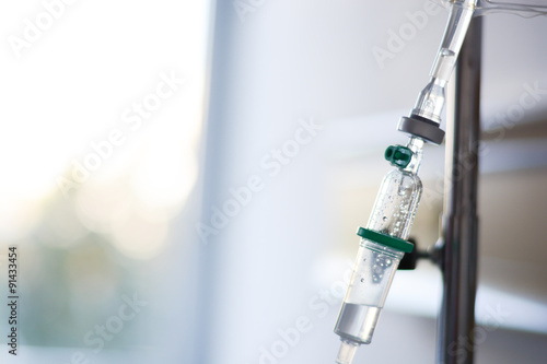 Intravenous drip or Perfusion recipient administrated in a hospital room photo