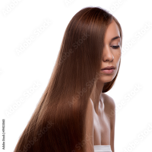 closeup portrait of a beautiful young woman with elegant long shiny hair