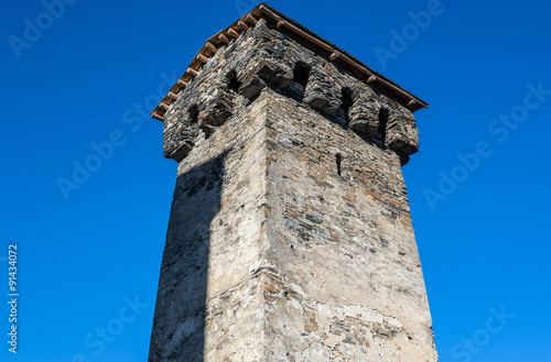 svanetian tower in Mestia town in Upper Svanetia region, Georgia photo