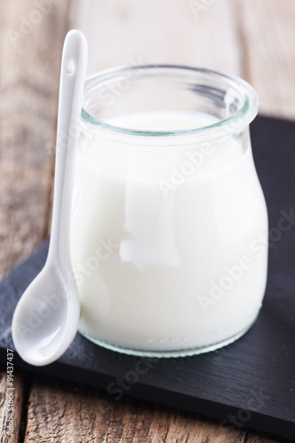 Homemade yoghurt in a glass jar.selective focus