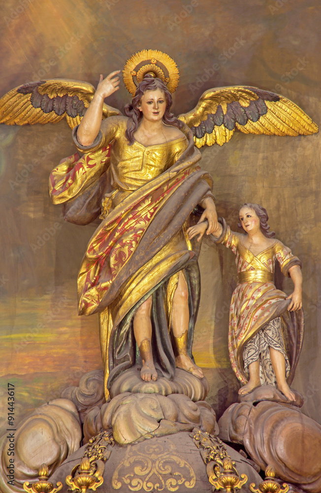 CORDOBA, SPAIN - MAY 27, 2015: The carved polychrome statue of archangel Raphael (Santo Angel) patron of the Town from 18. cent. on the altar in church Convento de Capuchinos (Iglesia Santo Anchel).