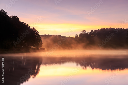 Beautiful foggy sunrise on a lake,Mae Hong Son,Thialand.