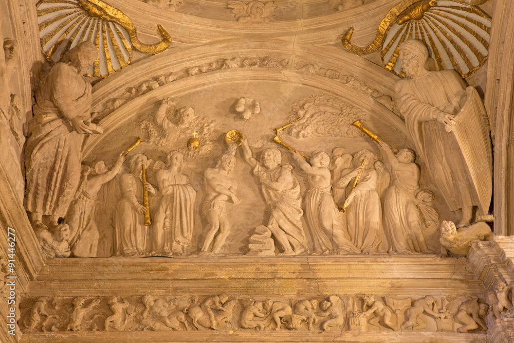 CORDOBA, SPAIN - MAY 27, 2015: The baptism of Christ relief in the cupola of baptistery in church Iglesia San Nicolas de la Villa by  Sebastian Penarredonda (1540 - 1555).