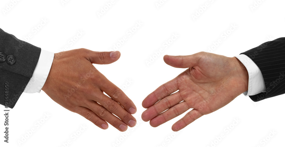 Two hands shaking in agreement isolated on white Two hands shaking in agreement isolated on white