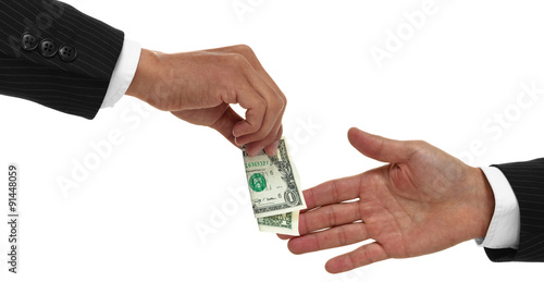 Close up of hand gving money to another