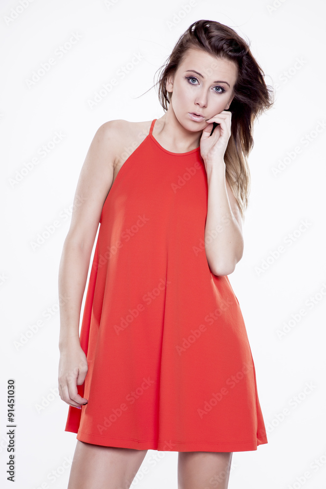Young slim sexy woman in fashionable dress isolated on white bac Young slim sexy woman in fashionable dress isolated on white bac