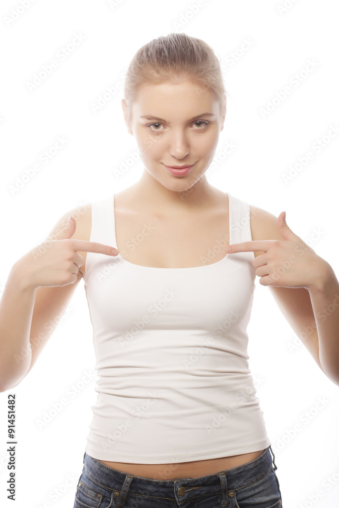 woman in blank white t-shirt showing at herself woman in blank white t-shirt showing at herself