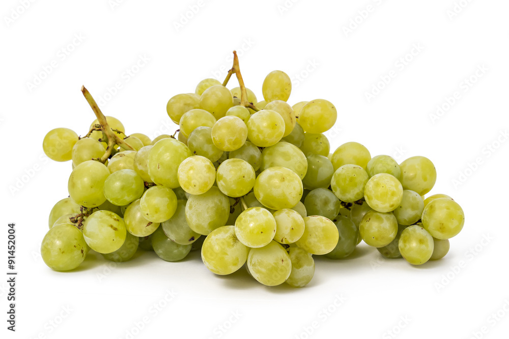 Fresh ripe white grapes cluster isolated on a white
