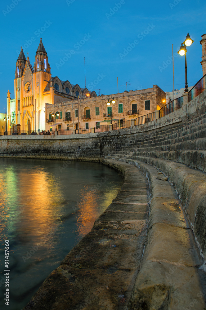 Fototapeta premium Church of Our Lady of Mount Carmel at night, St. Julian, Malta