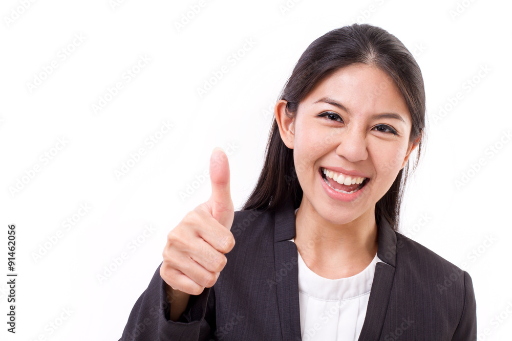happy, smiling, successful business woman showing thumb up gestu happy, smiling, successful business woman showing thumb up gestu
