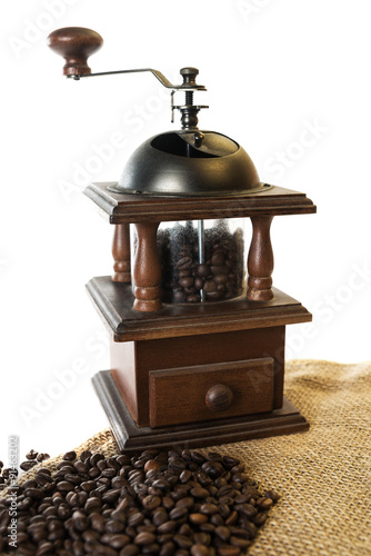 The stylized semi-antique coffee grinder