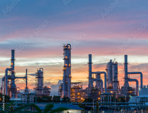 Silhouette of petrochemical plant or Oil and gas refinery in sunrise