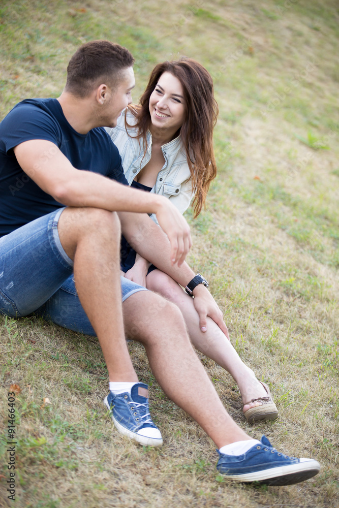 Couple flirting on lawn Couple flirting on lawn