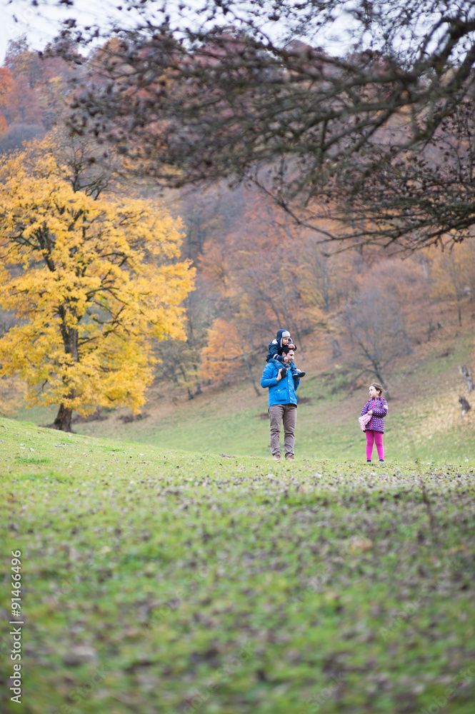 father with children in the mountains father with children in the mountains
