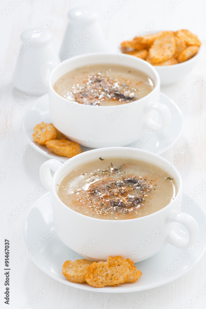 delicious mushroom cream soup with croutons, vertical delicious mushroom cream soup with croutons, vertical