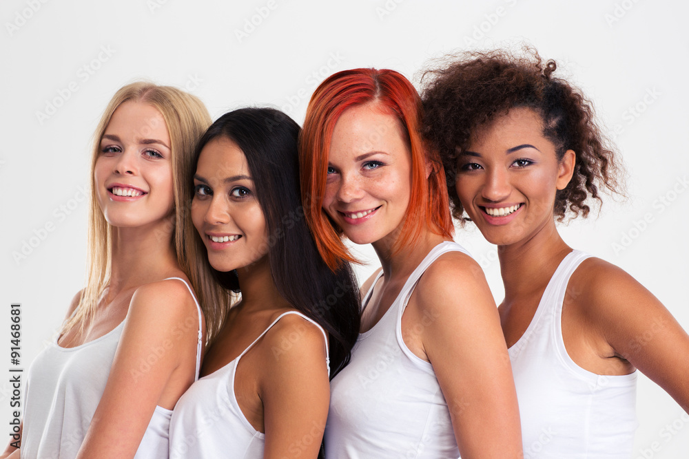 Four girls standing in a row Four girls standing in a row
