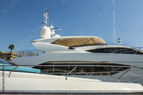Luxury Yacht anchored in Port Pierre Canto at the Boulevard de la Croisette in Cannes, France.